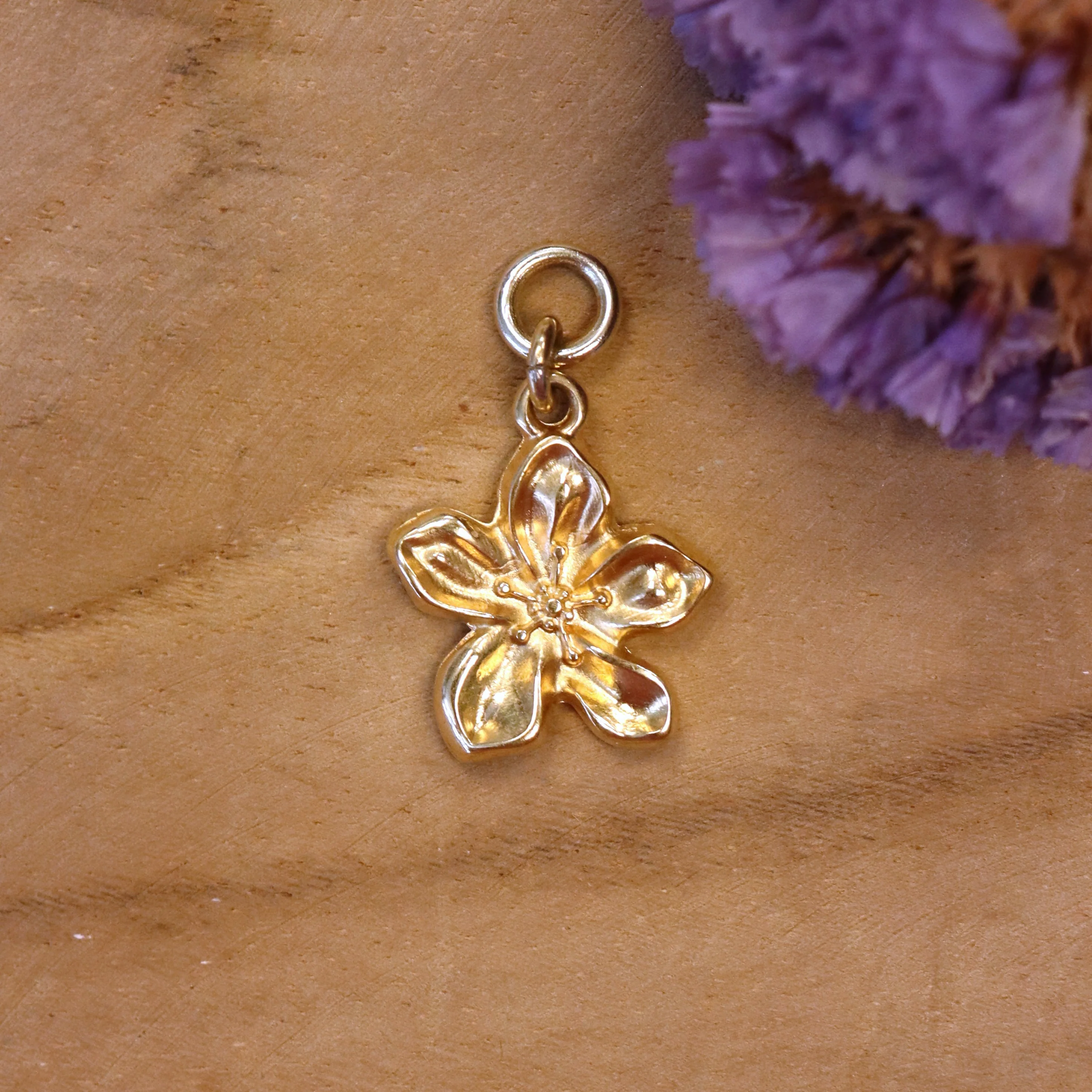 Oorringbedel bloem - goud